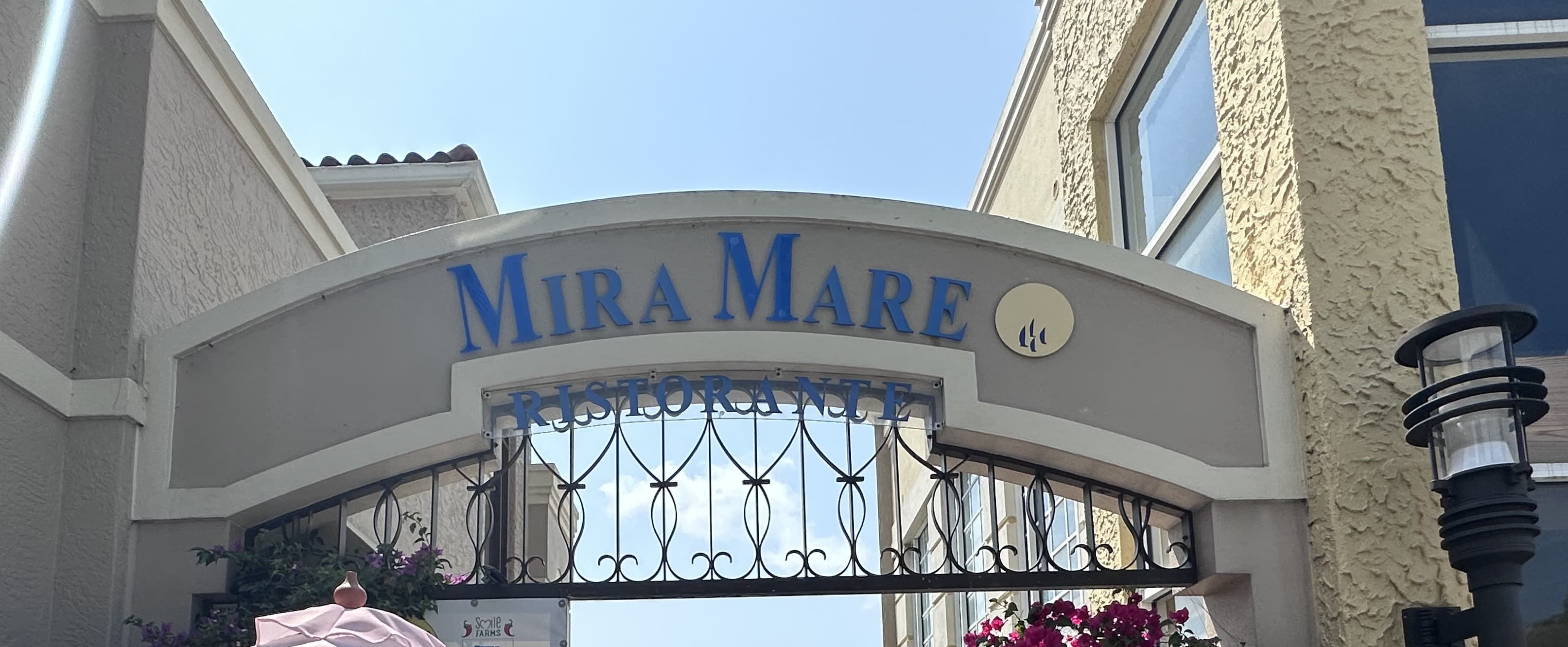 MiraMare Ristorante entrance archway signage on Venetian Bay, Naples